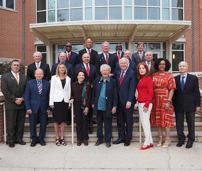 P​i​ctured from the left:  Honorary Trustee Abe Mitchell with Trustees Dr. Steve Furr; Dr. Scott Charlton; Ron Jenkins; Chandra Brown Stewart; Jimmy Shumock; Jim Yance; Ken Simon - Chair pro tempore; Ron Graham; Governor Kay Ivey - ex officio President and Chair​; Dr. Steve Stokes; Tom Corcoran; Lenus Perkins; Arlene Mitchell; Mike Windom; Alexis Atkins and Margie Tuckson; and President Tony Waldrop.